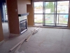 The carpet-less living room after Green Coast. Nothing but base boards left.