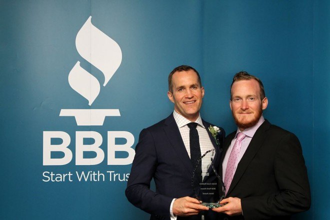 Eamonn and Cein Duignan celebrate their BBB Torch Award win in the Green category.